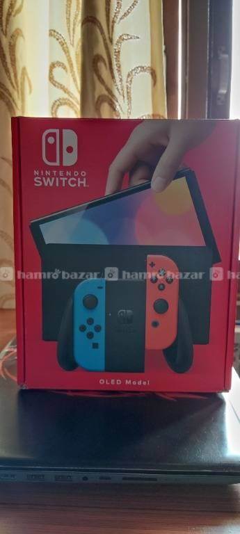 Nintendo Switch OLED model With Neon Red & Blue