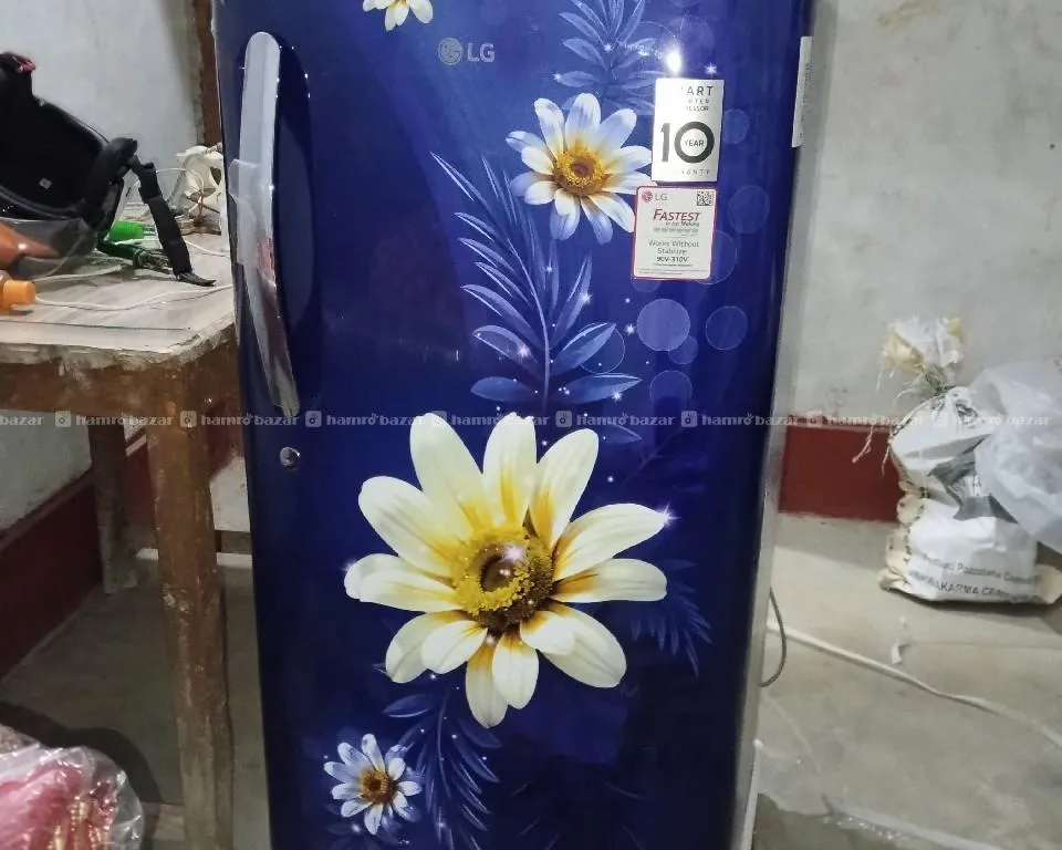 LG FASTER ICE MACKING FRIDGE
