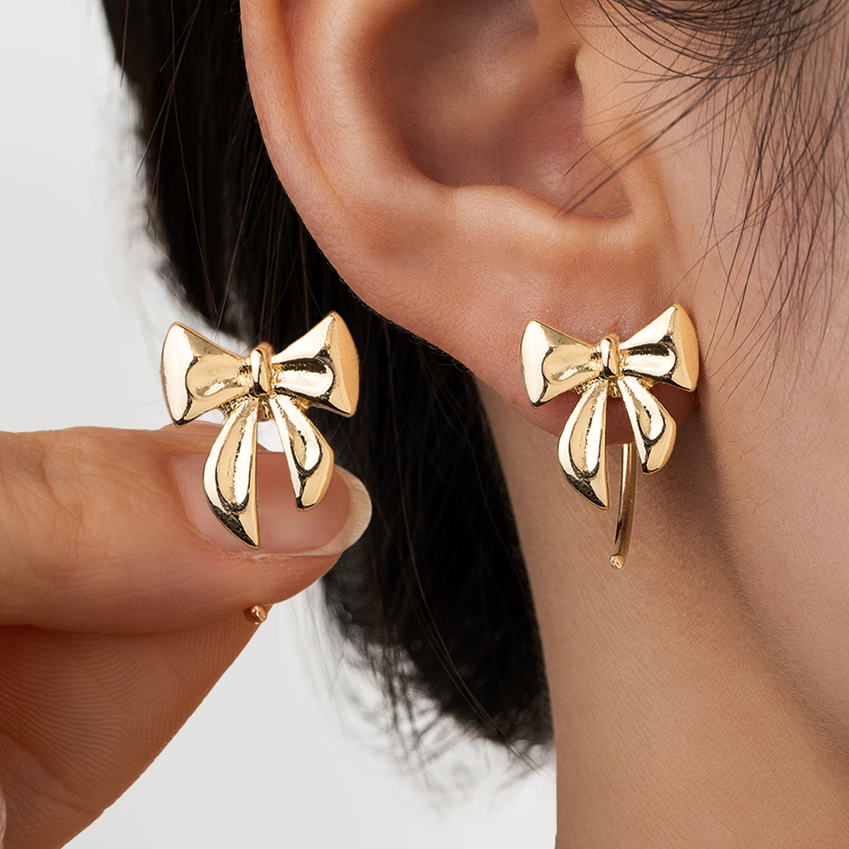 1 pair of elegant and fashionable alloy bow ear hooks, simple and versatile women's earrings