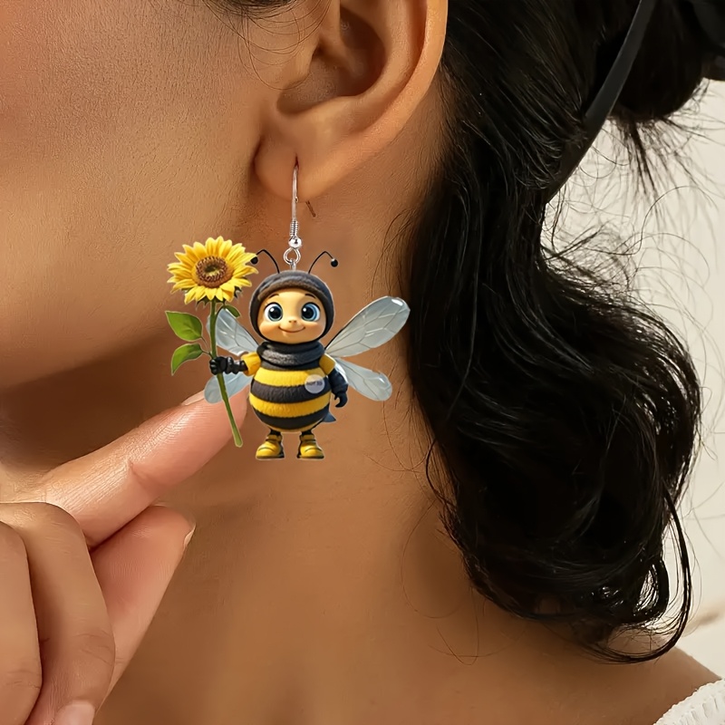 1 pair of original design little bee acrylic earrings holding sunflowers, a pair of beautiful and interesting ladies earrings g