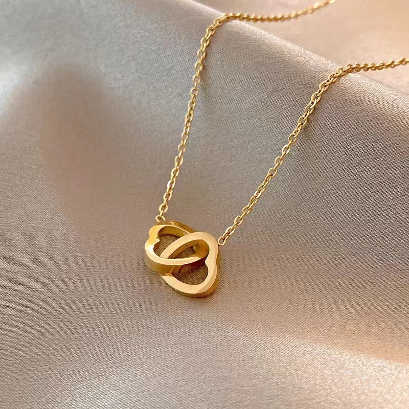 Female niche design fashionable simple collarbone chain versatile double heart hollow necklace