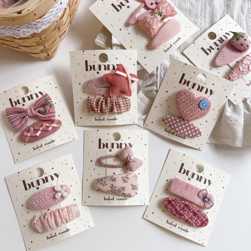 Korean - style pink geometric fabric kids' clip set: star & floral cute designs, sweet girl vibe, perfect for side bangs, gentle