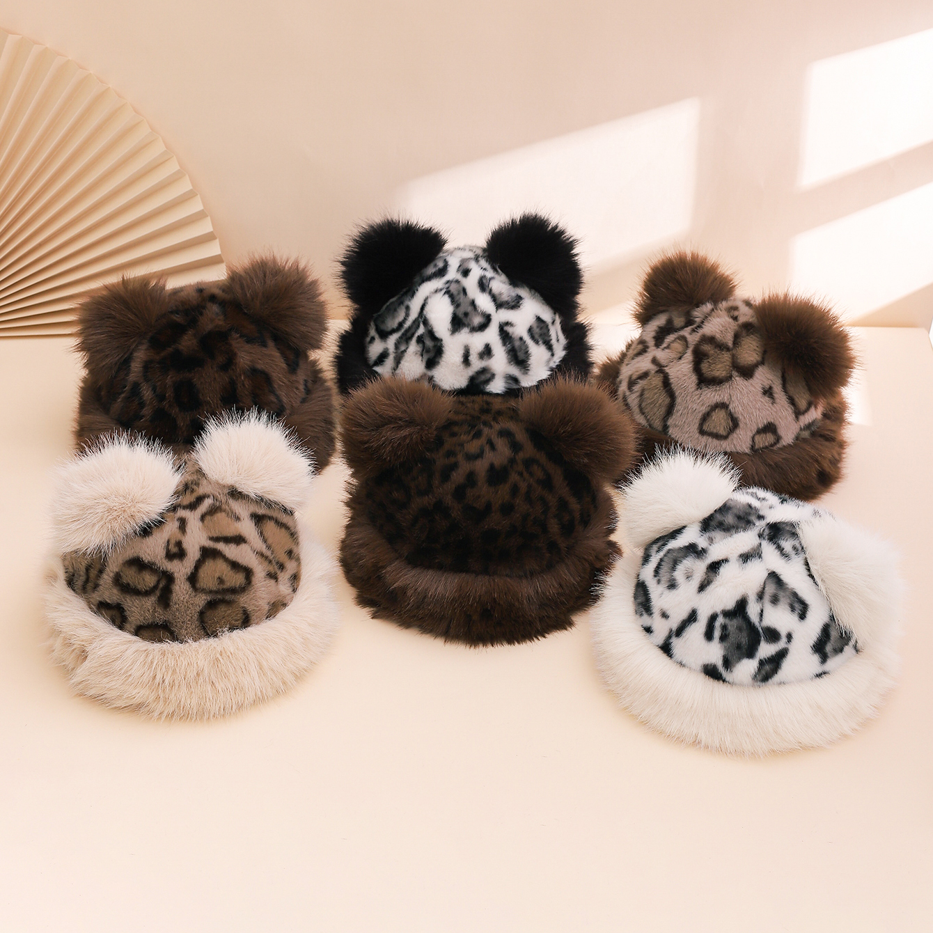 The new leopard-print plush big-eared fun hat is a cute and warm woolen cap for outdoor travel in autumn and winter