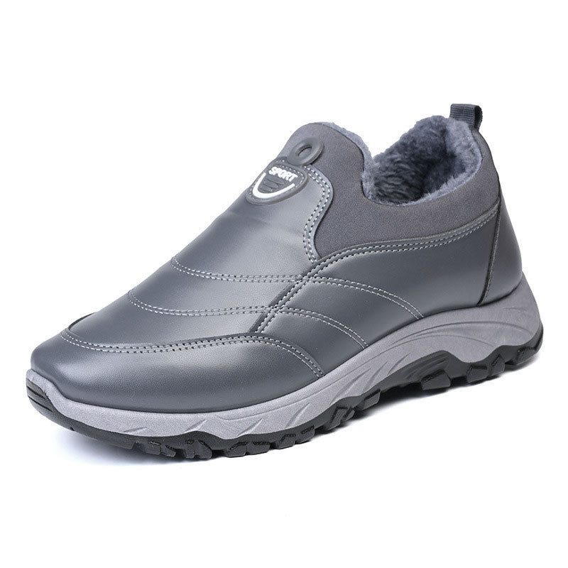 A pair of children's winter velvet warm snow boots with leather waterproof and anti-slip wear-resistant high-top cotton shoes