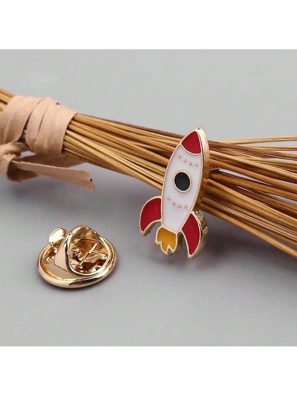 1PCS Creative Cartoon Rocket Enamel Pin - Fun Backpack & Clothing Accessory with Unique Oil Dripping Design