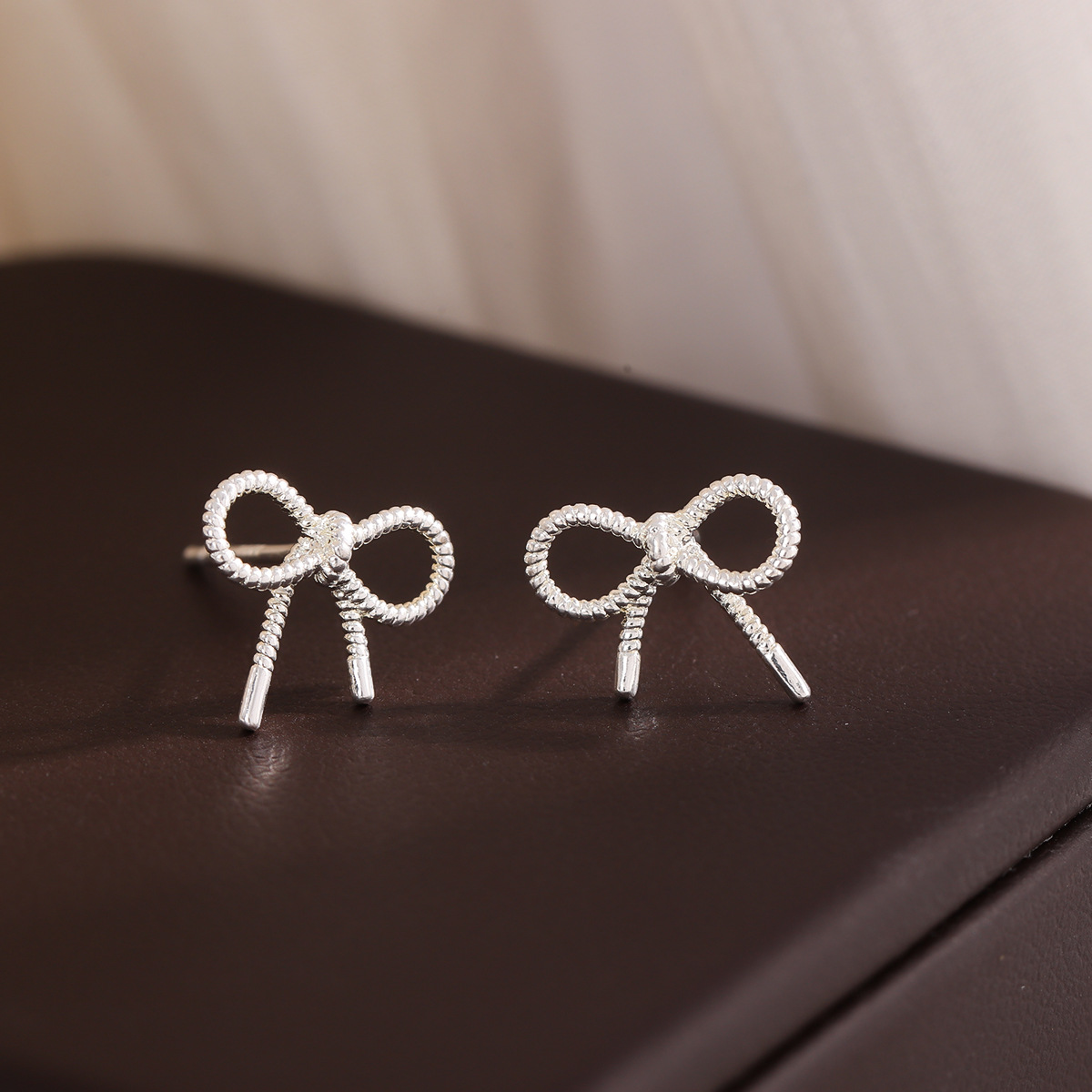 Fashion Simple Hollow Versatile Bow 925 Sterling Silver Jewelry Personality Stud Earrings E258