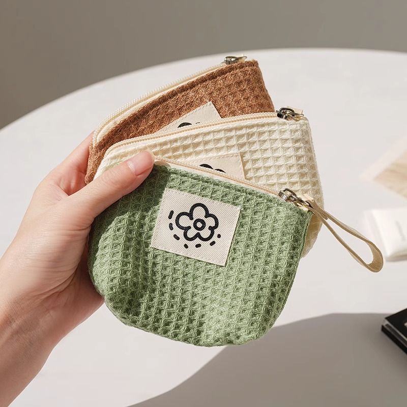 Japanese cute simple waffle change bag storage bag women's wrist bag