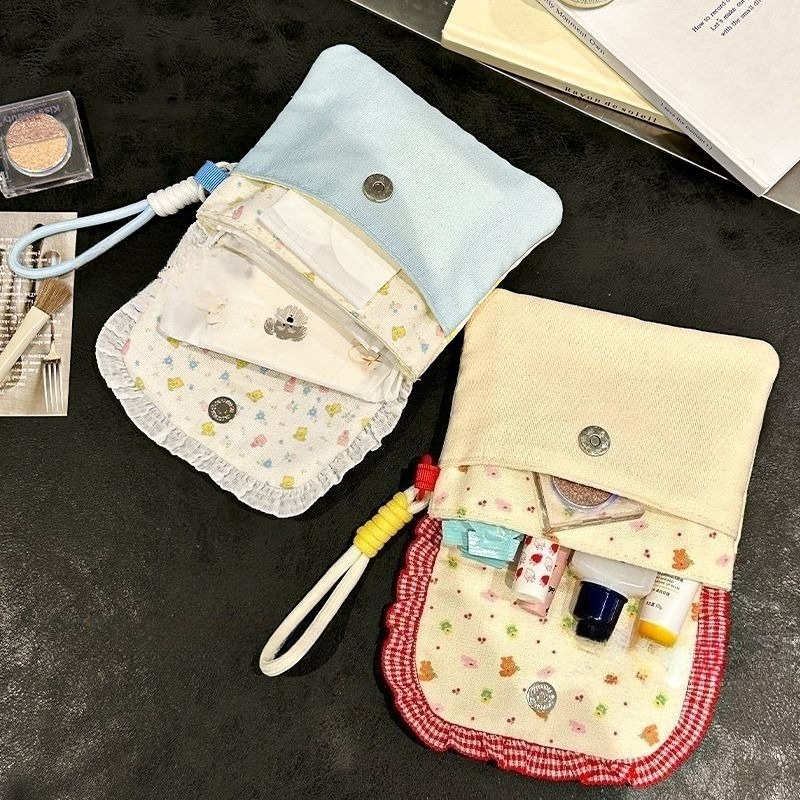 Cute floral sanitary napkin storage bag, female large capacity student portable handheld storage bag for going out