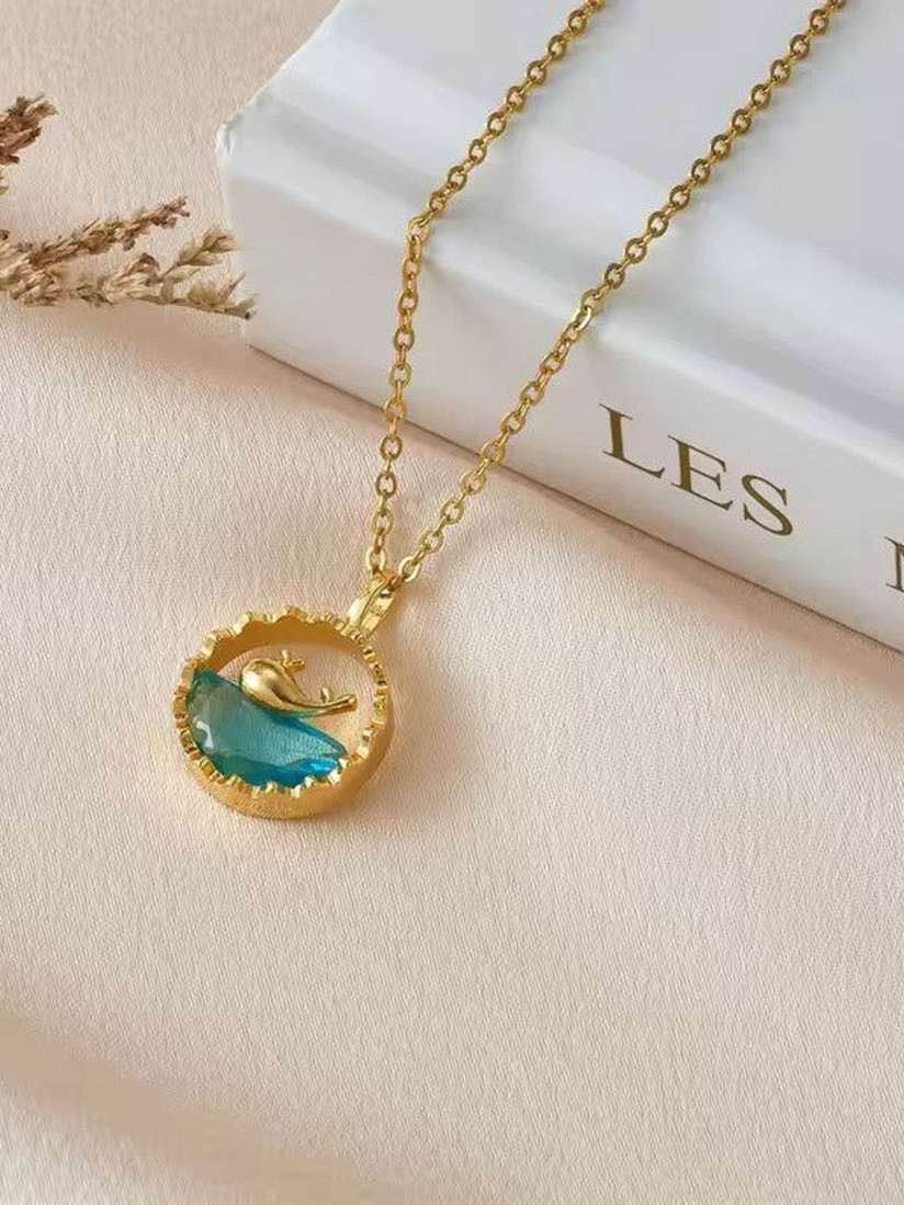 Stainless necklace with ocean wave and whale