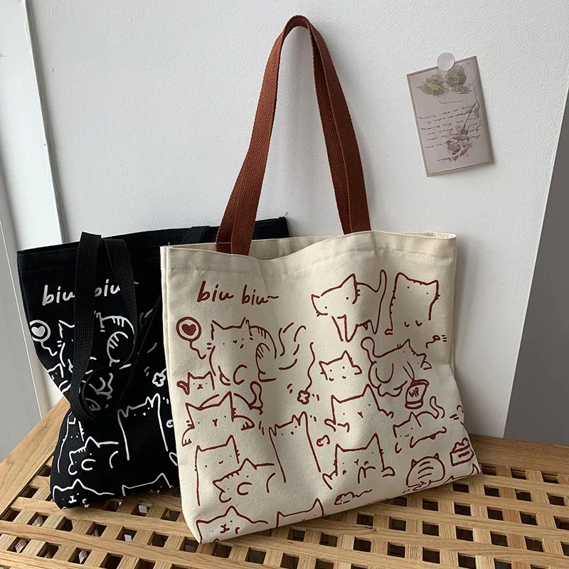 2026 Canvas Bag Womens Handbag Shopping Bag Cute Cat Zipper Handbag Designer Bag Japanese Style Cartoon Small Shoulder Bag