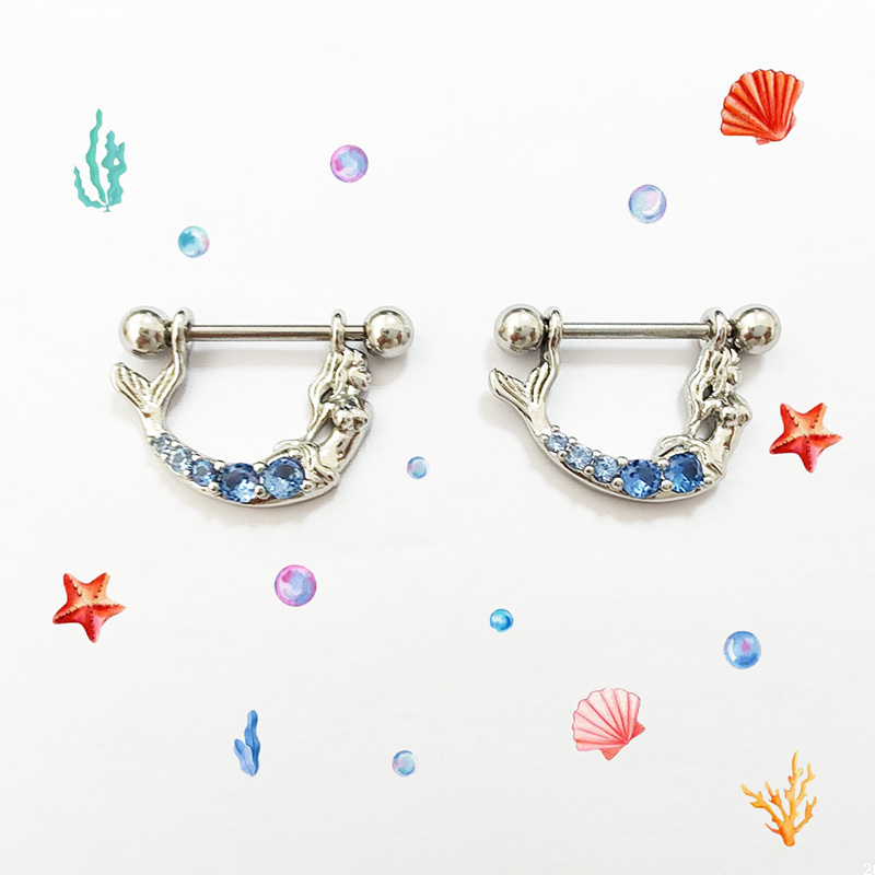 A pair of stainless steel girl nipple rings in a sea style, mermaid blue zircon, niche, cute, and romantic. Small beads in