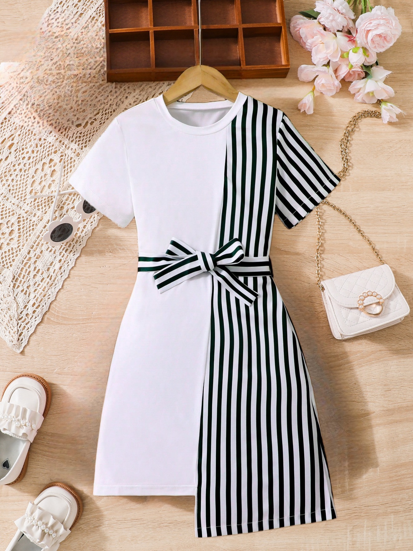 Girls black and white striped dress: stylish belt design, elegant bow decoration
