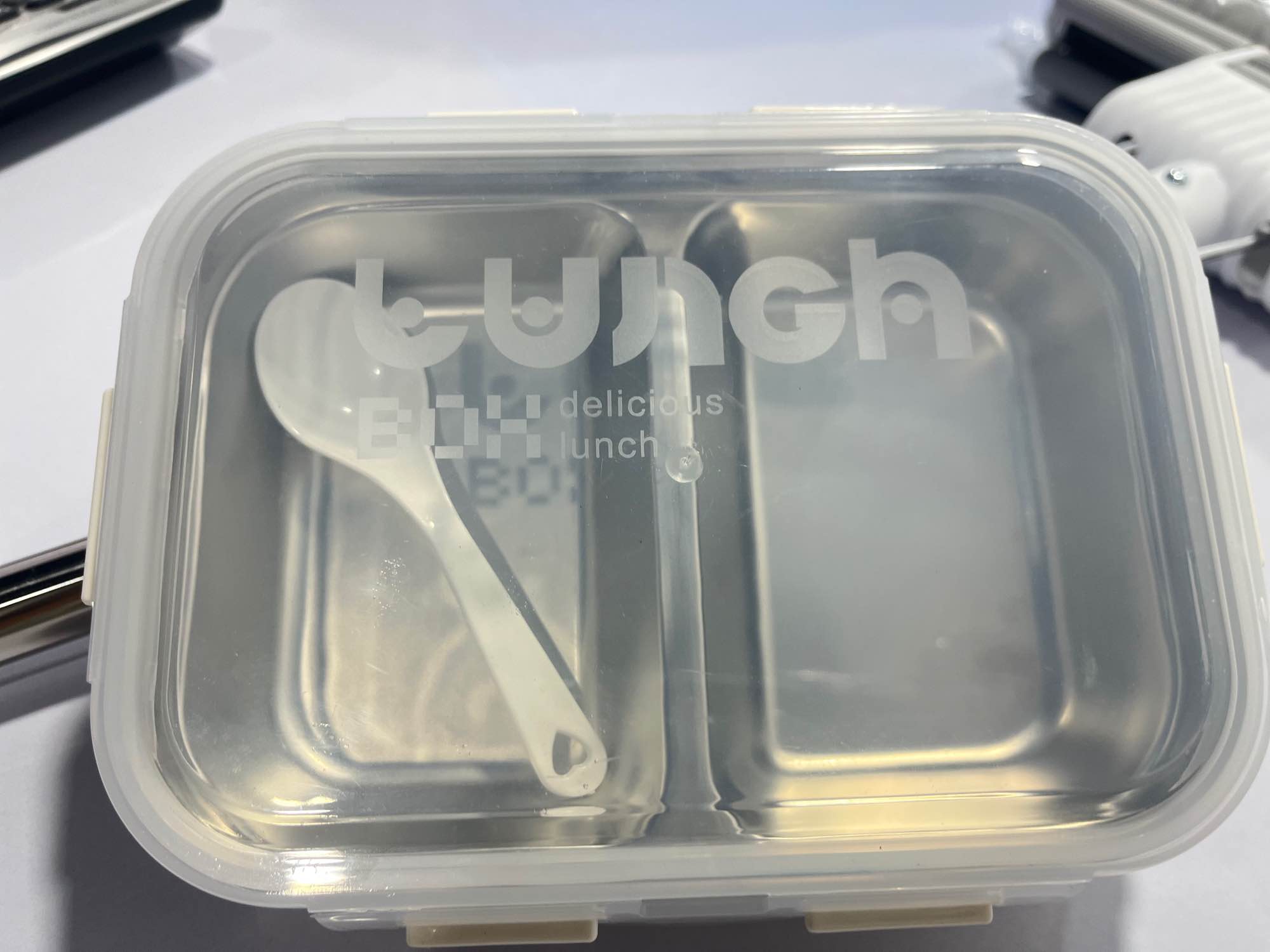 Delicious Lunch box 2 compartment with one spoon airtight lock