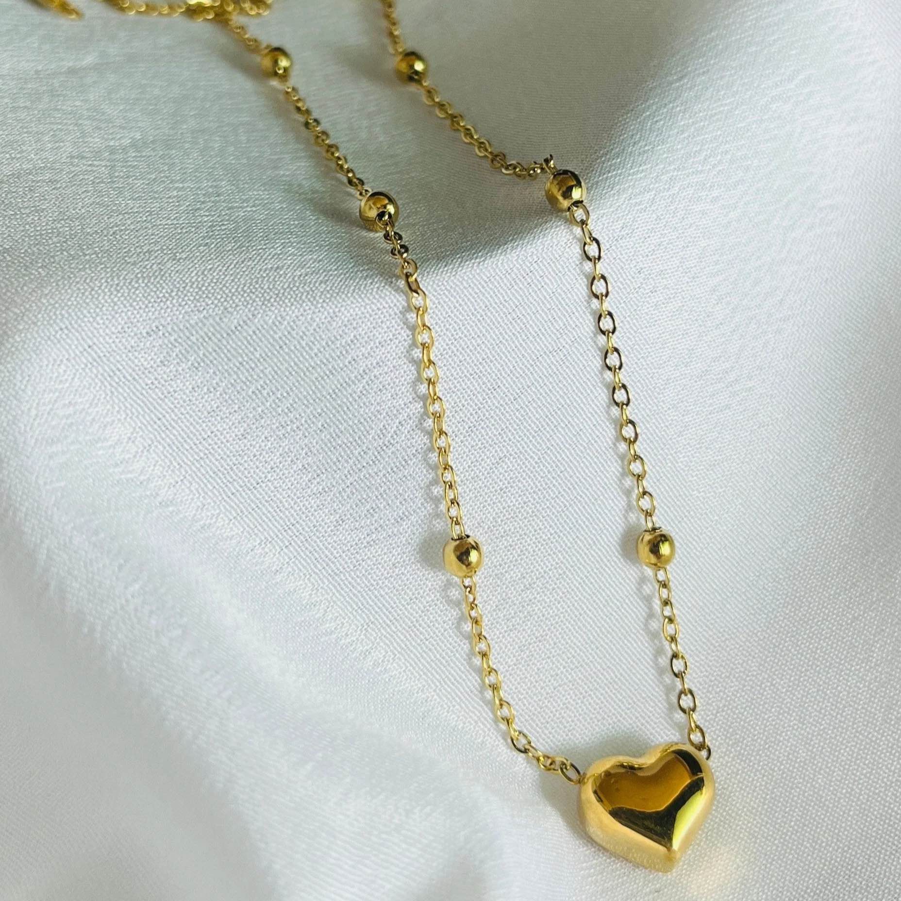 Gold plated stainless necklace with love pendant