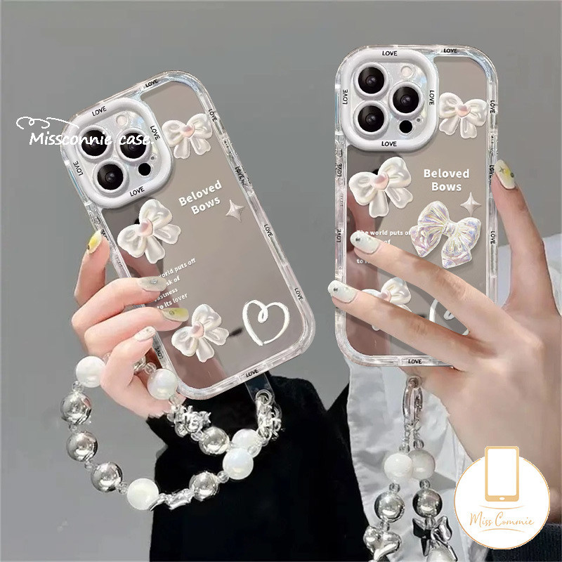 Romance Pearl Bowknot English Tag Casing Compatible for IPhone 15 11 14 13 12 Pro Max 7Plus XR XS Max X 15 7 8 Plus Fashion Loving Heart Make Up Mirror Puff Luxury Bracelet Case
