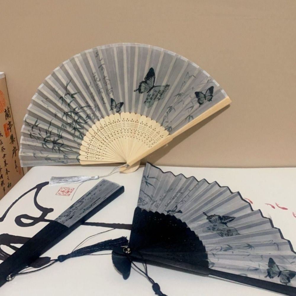 New Chinese Style Tassel Folding Fan Portable High Quality Classical Dance Fan Summer Wooden Shank Ink Painting Fan