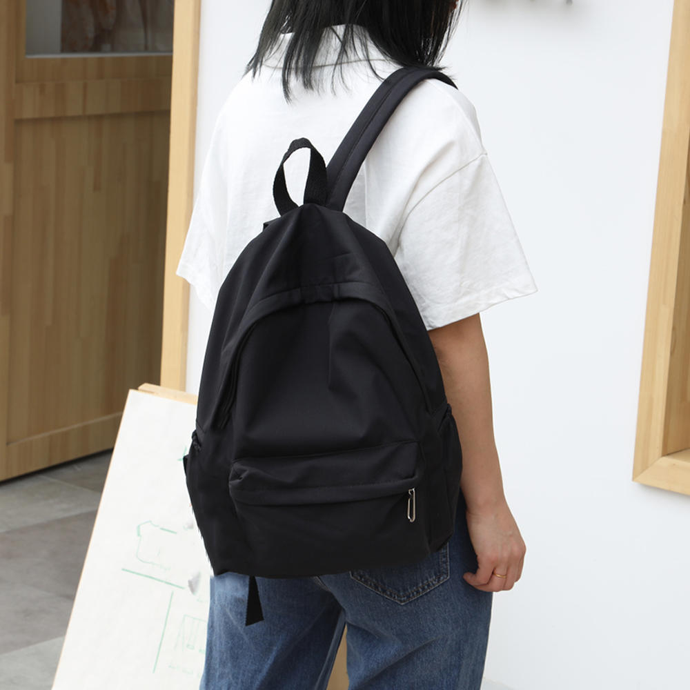 Lightweight Nylon backpack Stylish Solid color High quality Women's backpack New Durable High capacity travel bag for Travel College Daily commute Outdoor activities Leisure and casual use