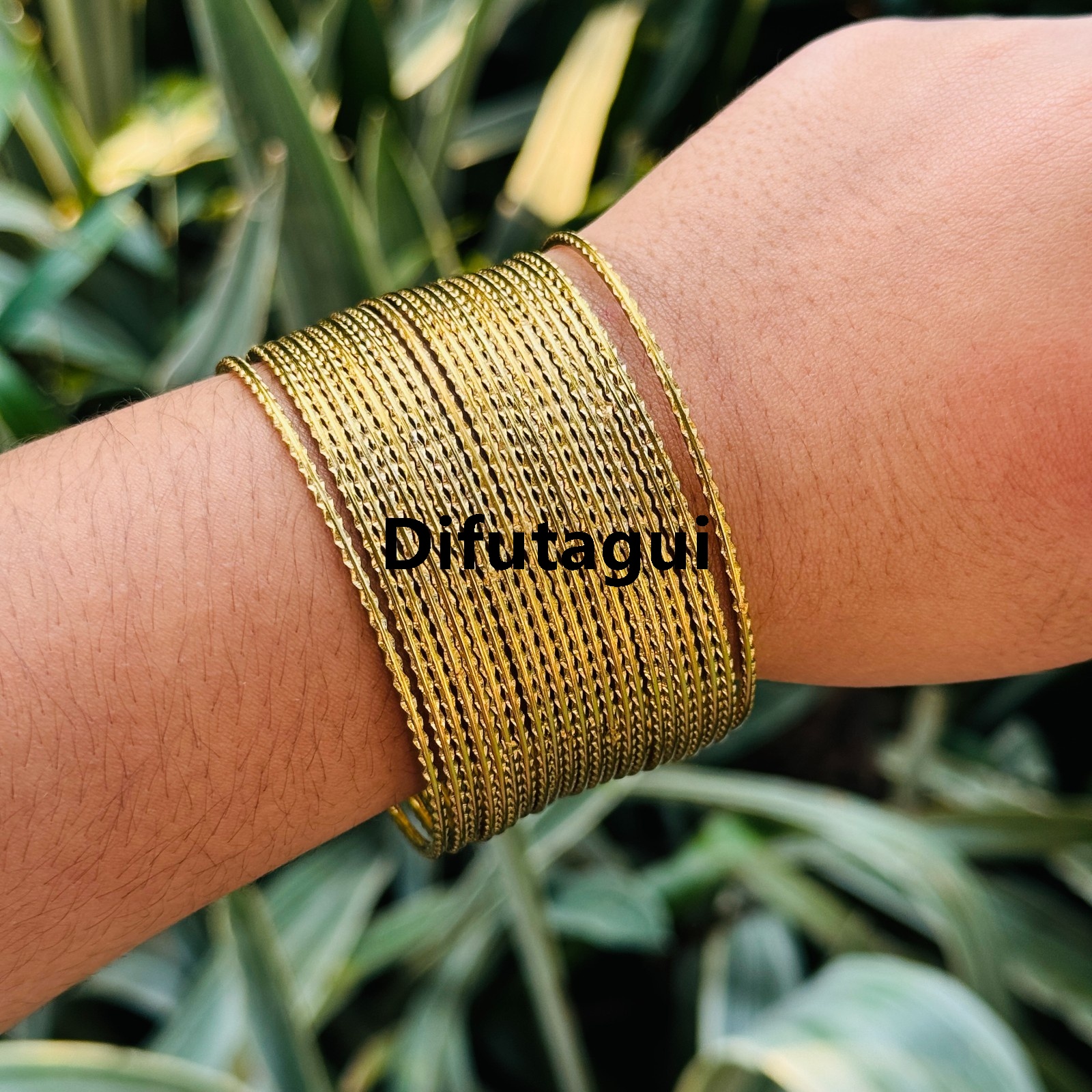Difutagui 50% discount BOOM Gold plated Bangle Collection Indian Bollywood Desire Stunning Look Finely Cut Edges Fifty percent discount Tango Tune Depiction of Fine Jewelry Designer Bangle Bracelets Set of 22 in Gold Tone for Women.