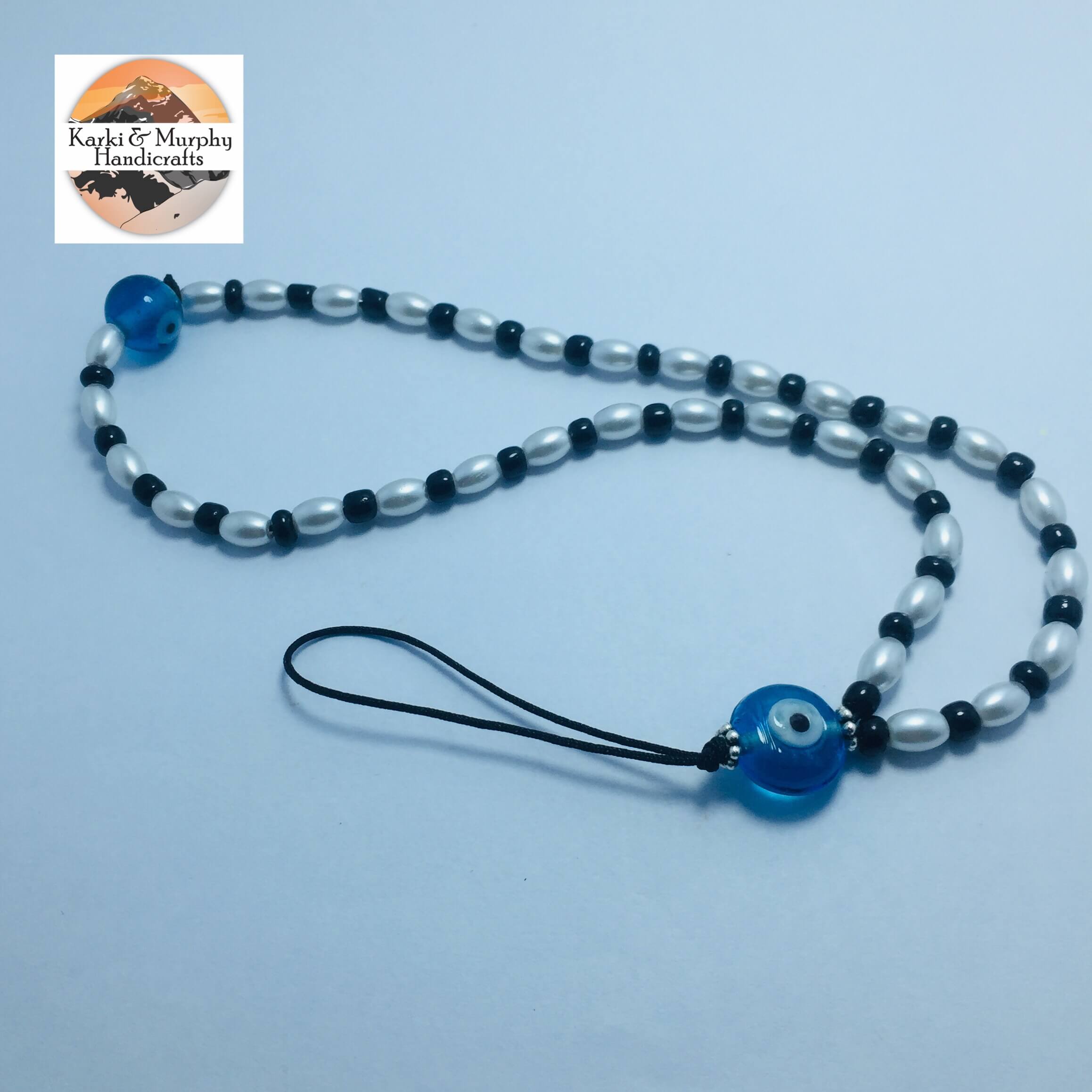 Phone Charm. Evil Eye And Rice Moti Beaded Phone Charm