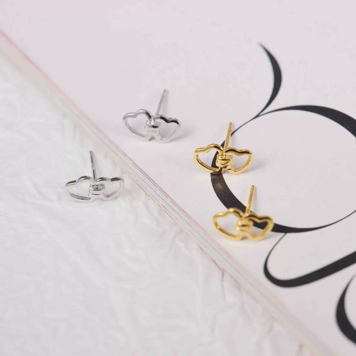 【Hottest Trends】Ring-linked love earrings women's simple niche design sense hollow double heart earrings small fresh commuter earrings