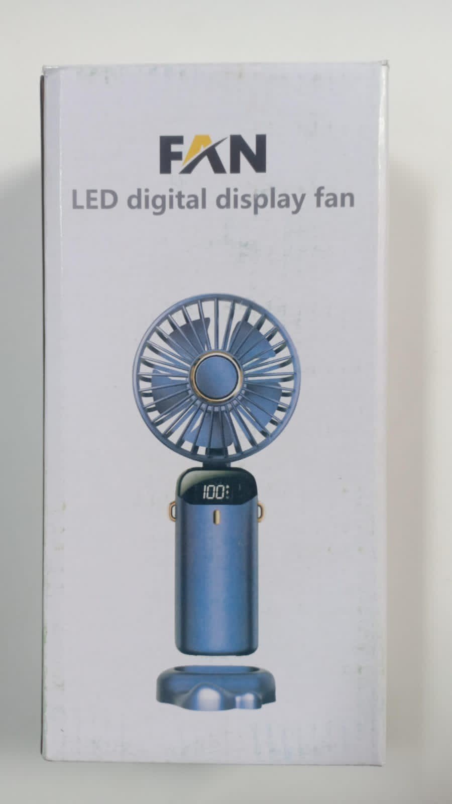 portable handheld fan featuring an LED digital display.