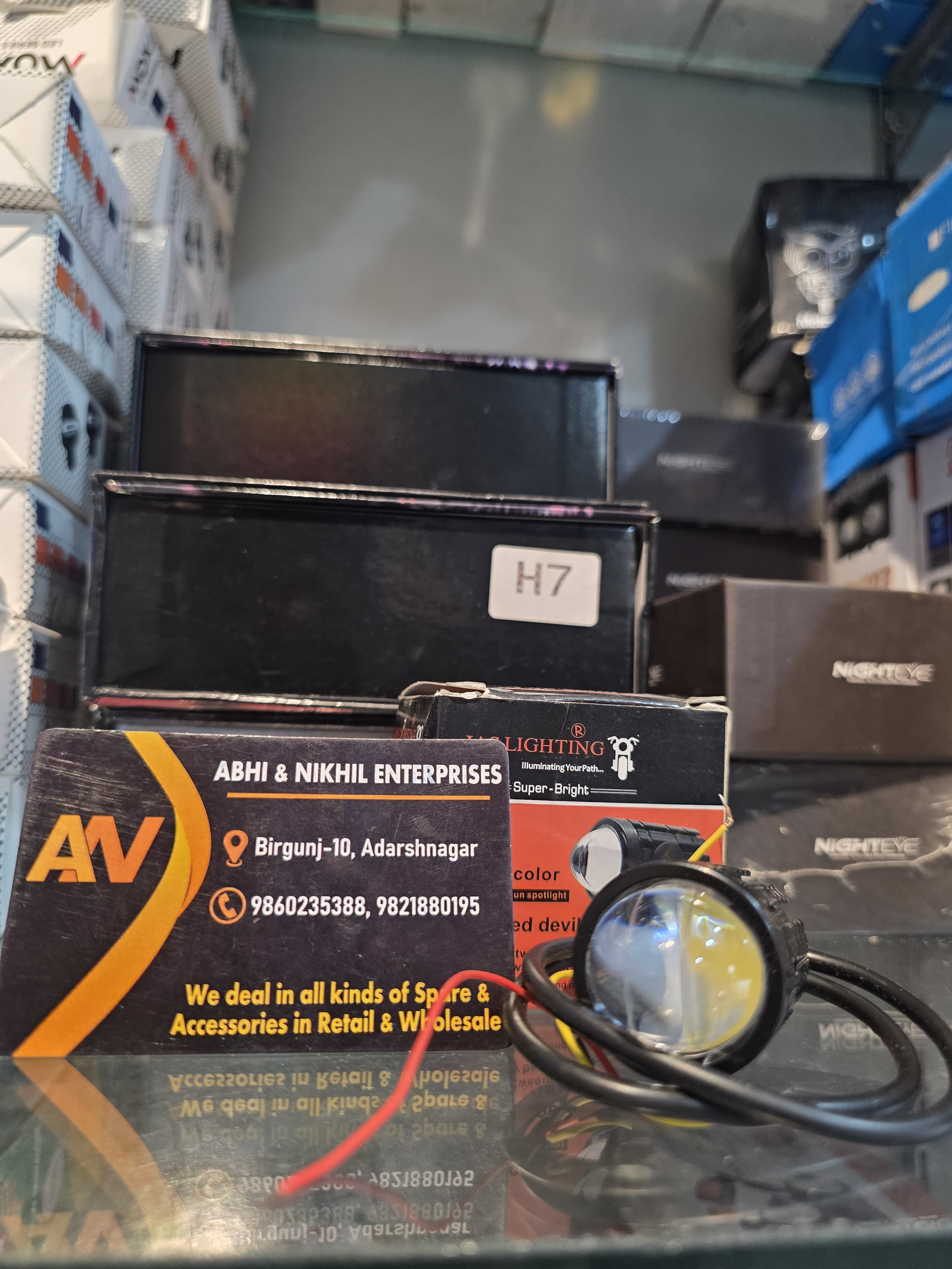 Mini LED projector spotlight for motorcycles, commonly used as an auxiliary fog/driving light.