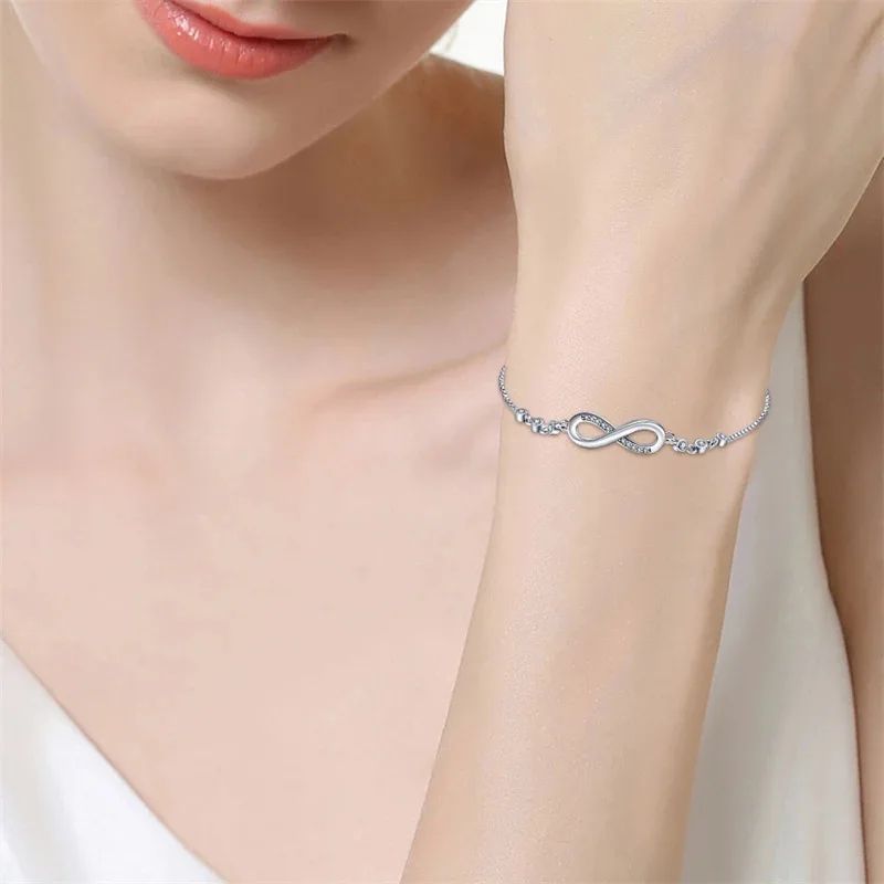 Infinity Glow Adjustable Bracelet - Women Cubic Zirconia Jewelry in Gold, Rose Gold, and Silver.