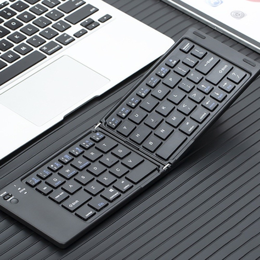 Fashion Slient Wireless Folding Keyboard Mini Slim Design Bluetooth Keyboard Lightweight Universal Foldable Keyboard Tablet