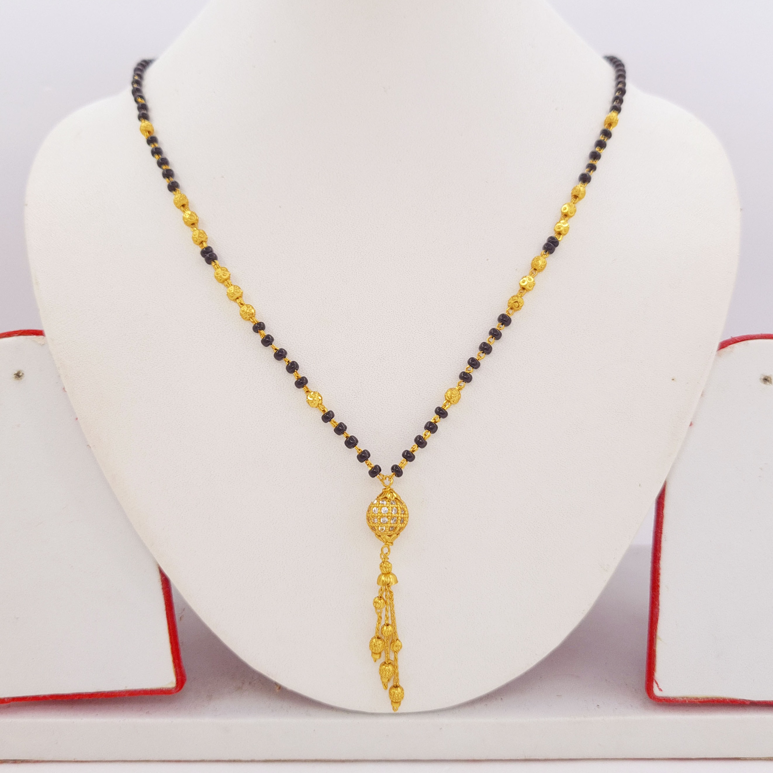 Black Crystal Beads With American Diamond Stone Studded Ball Gold Plated Mangalsutra For Women