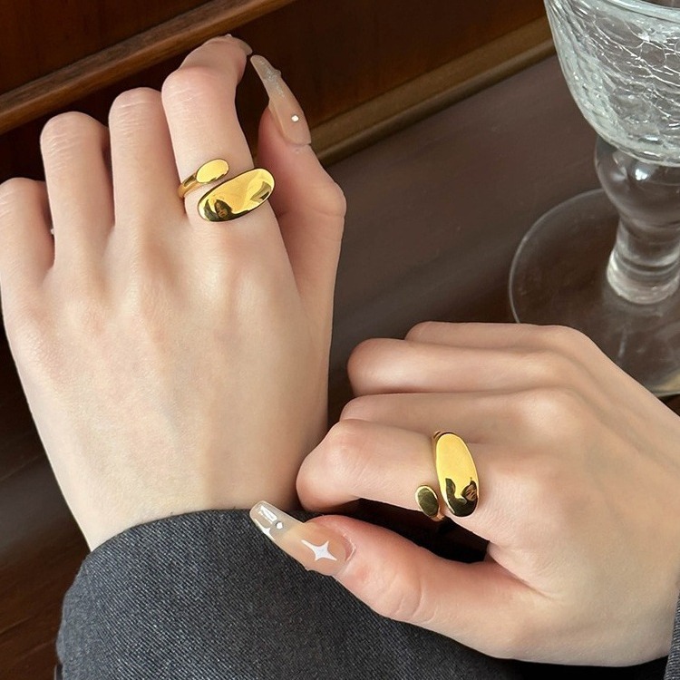 European and American style light luxury titanium steel plated 18K gold color preservation opening ring female metal versatile ins niche trendy index finger ring