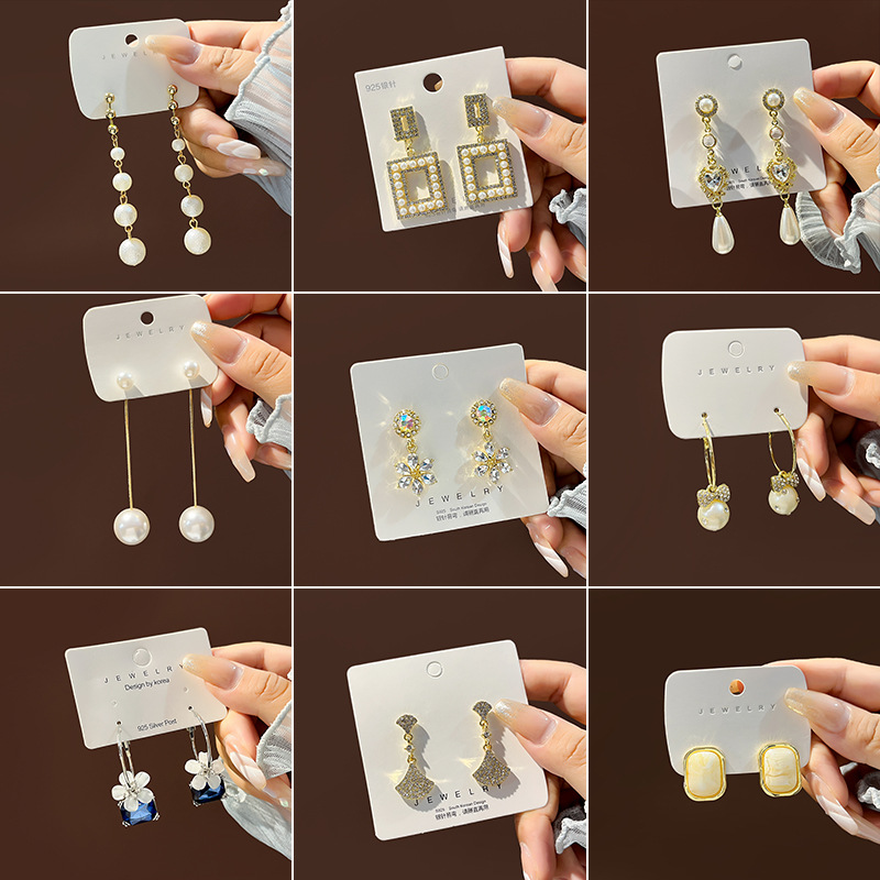 Korean high-end pearl earrings collection silver needle vintage small fragrance style diamond eight-pointed star stud earrings wholesale
