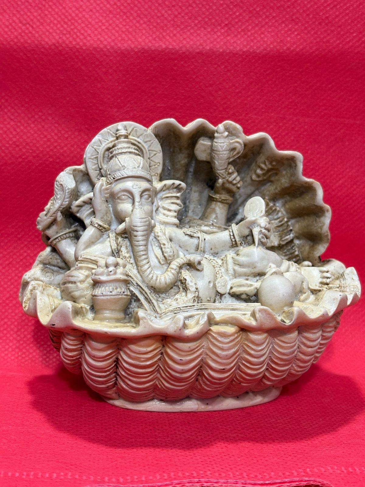 statue of Lord Ganesha, a widely revered Hindu deity associated with wisdom, prosperity, and the removal of obstacles